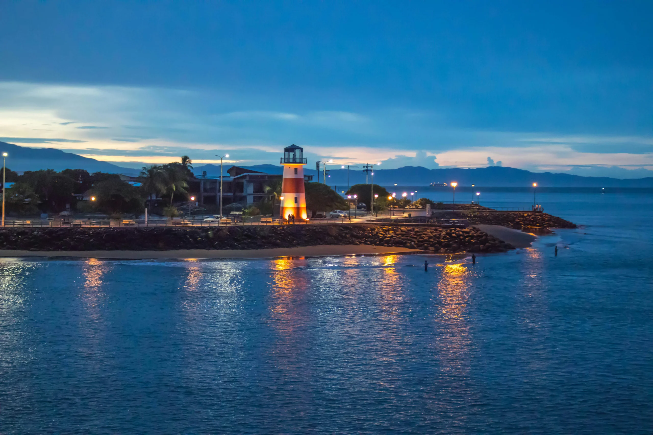 Scenic view of a lighthouse at dusk in Puntarenas, Costa Rica. Tranquil seaside atmosphere.